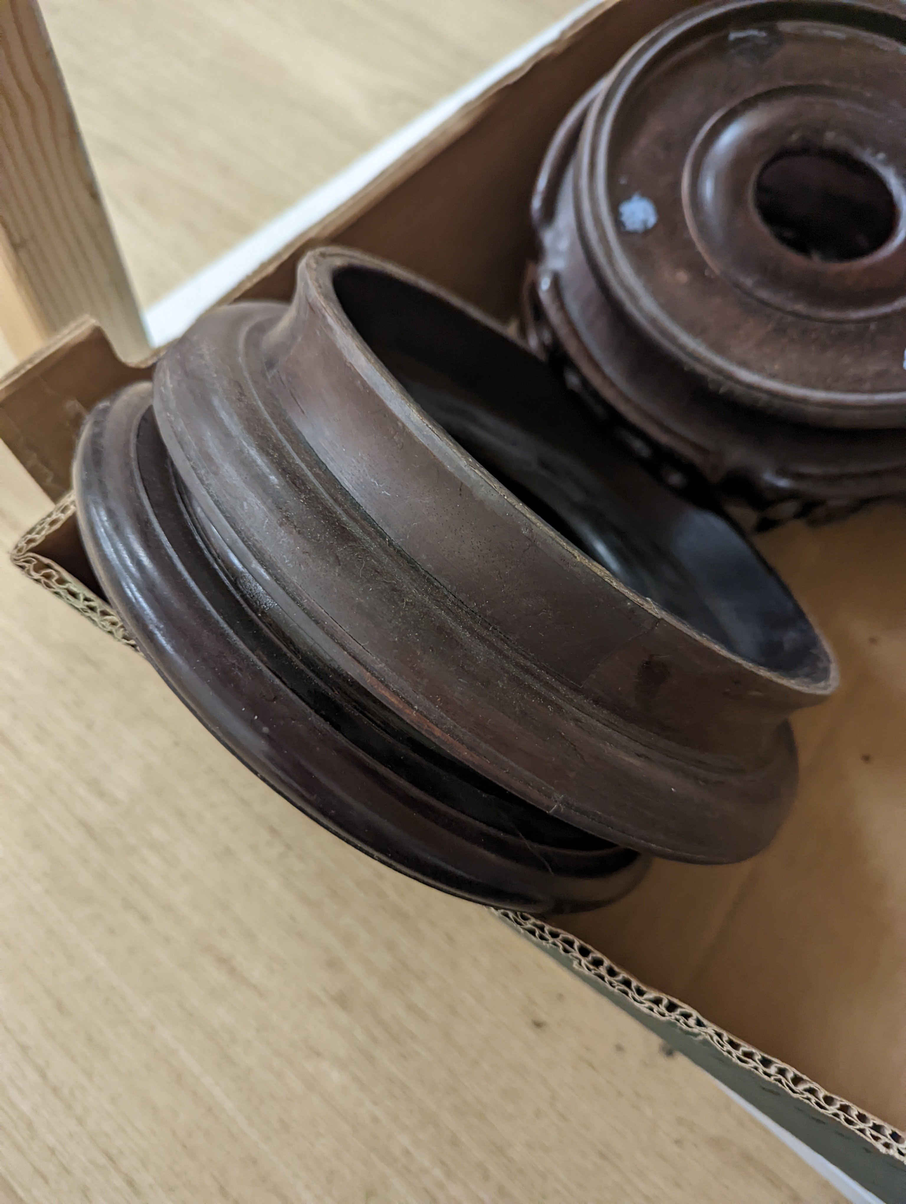 A collection of Chinese stands and bases, 1 box